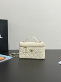 Chanel quilted leather mini bag, light cream, top handle and chain strap