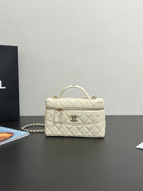 Chanel quilted leather mini bag, light cream, top handle and chain strap