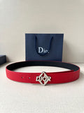 Red Dior belt with silver buckle and embossed logo on textured leather strap.