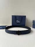 Dior belt in dark blue leather with studded holes and Dior logo buckle.