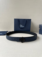 Dior belt in dark blue leather with studded holes and Dior logo buckle.