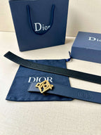 Dark blue leather belt with Dior logo buckle and matching fabric pouch and boxes.