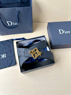 Dark blue leather Dior belt with Dior logo buckle in a gift box.