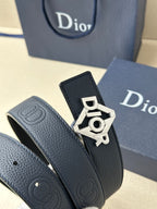 Dark blue leather belt strap with gold-toned Dior logo buckle detail.