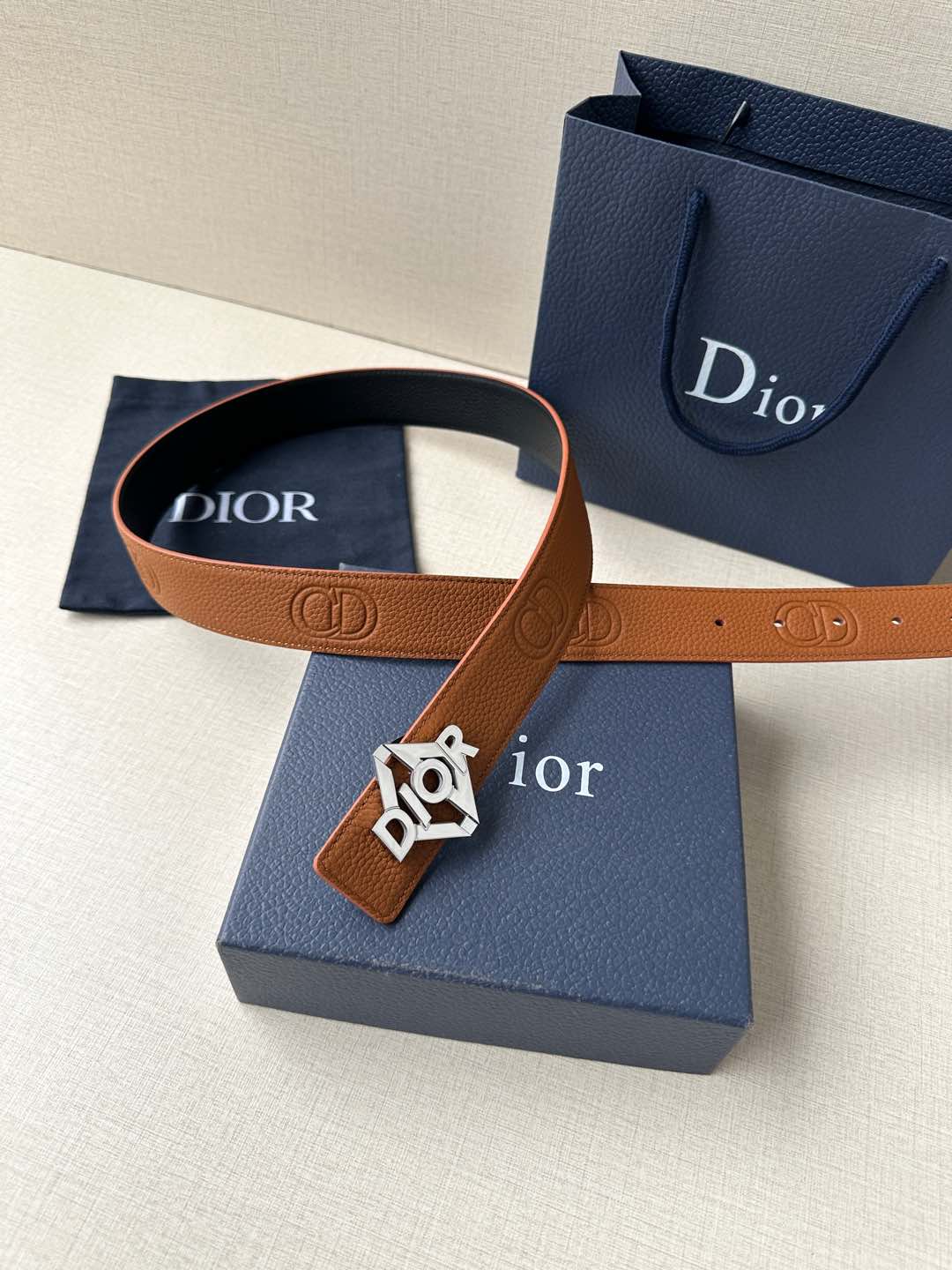 Dior belt with tan leather strap and silver-toned logo buckle