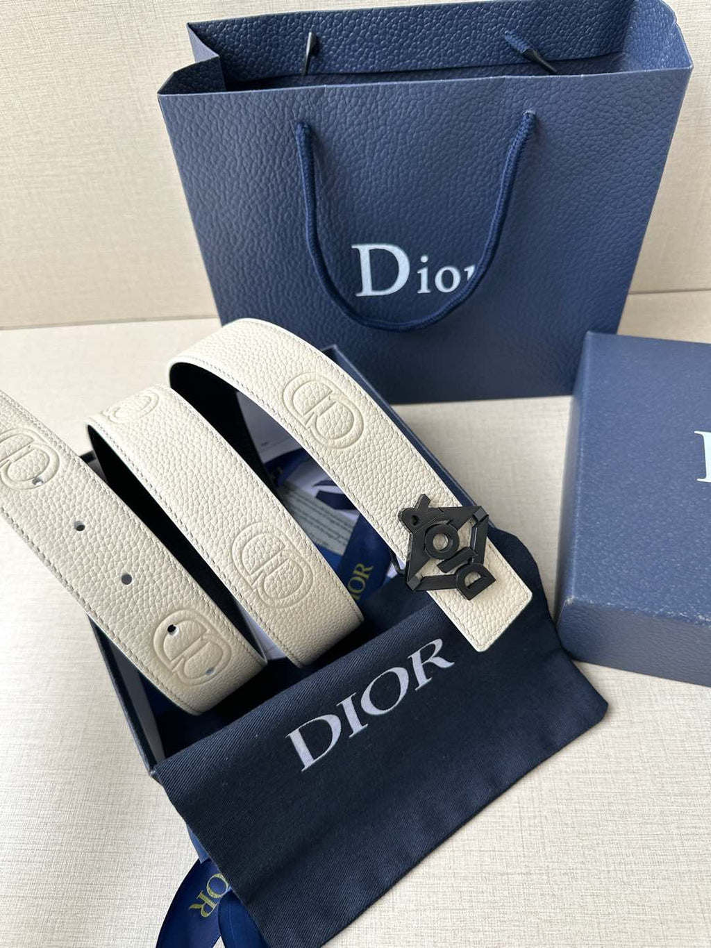 Ivory leather belt with silver-tone Dior buckle and textured pattern