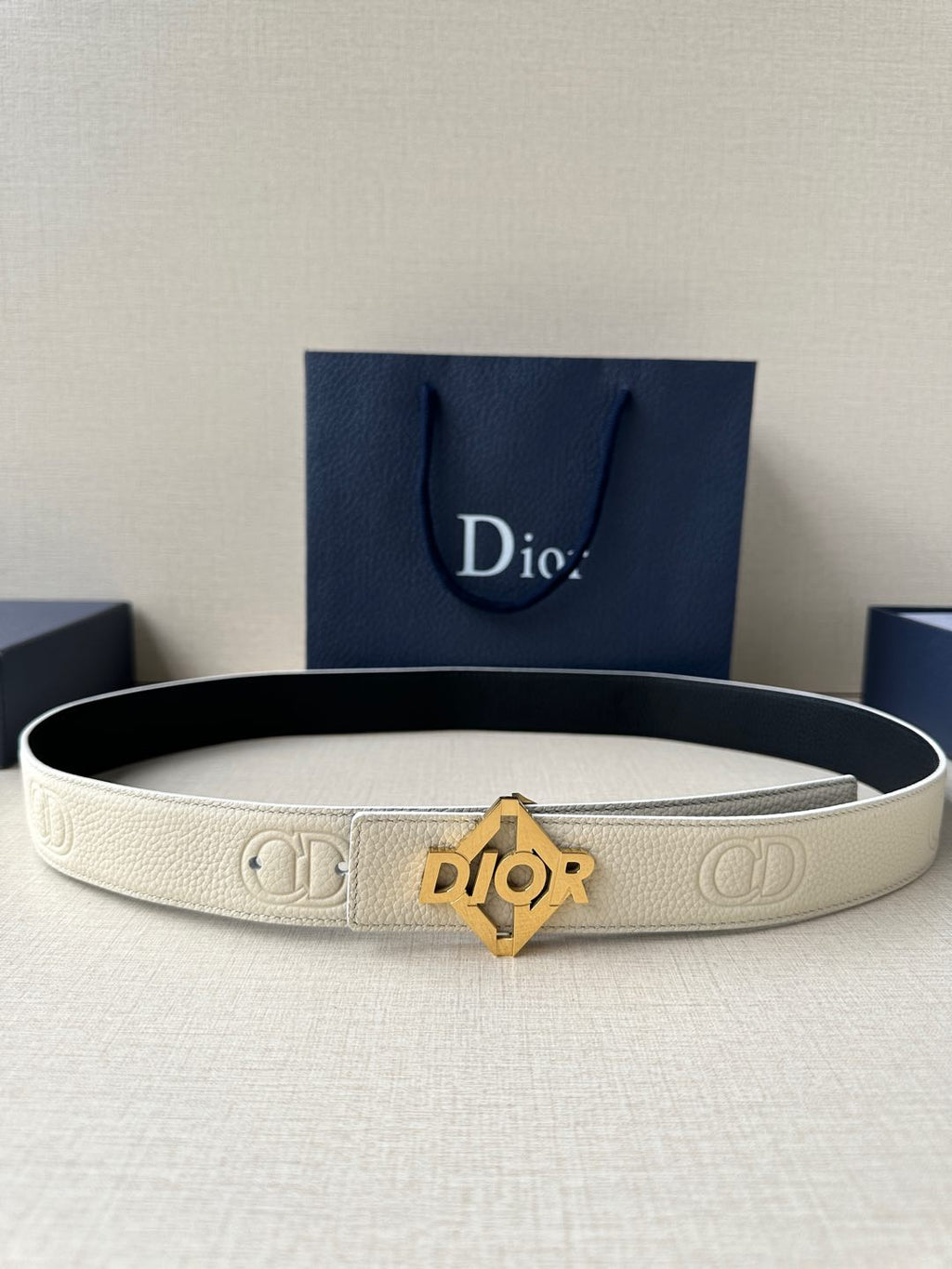 Ivory textured leather belt with gold Dior-logo buckle