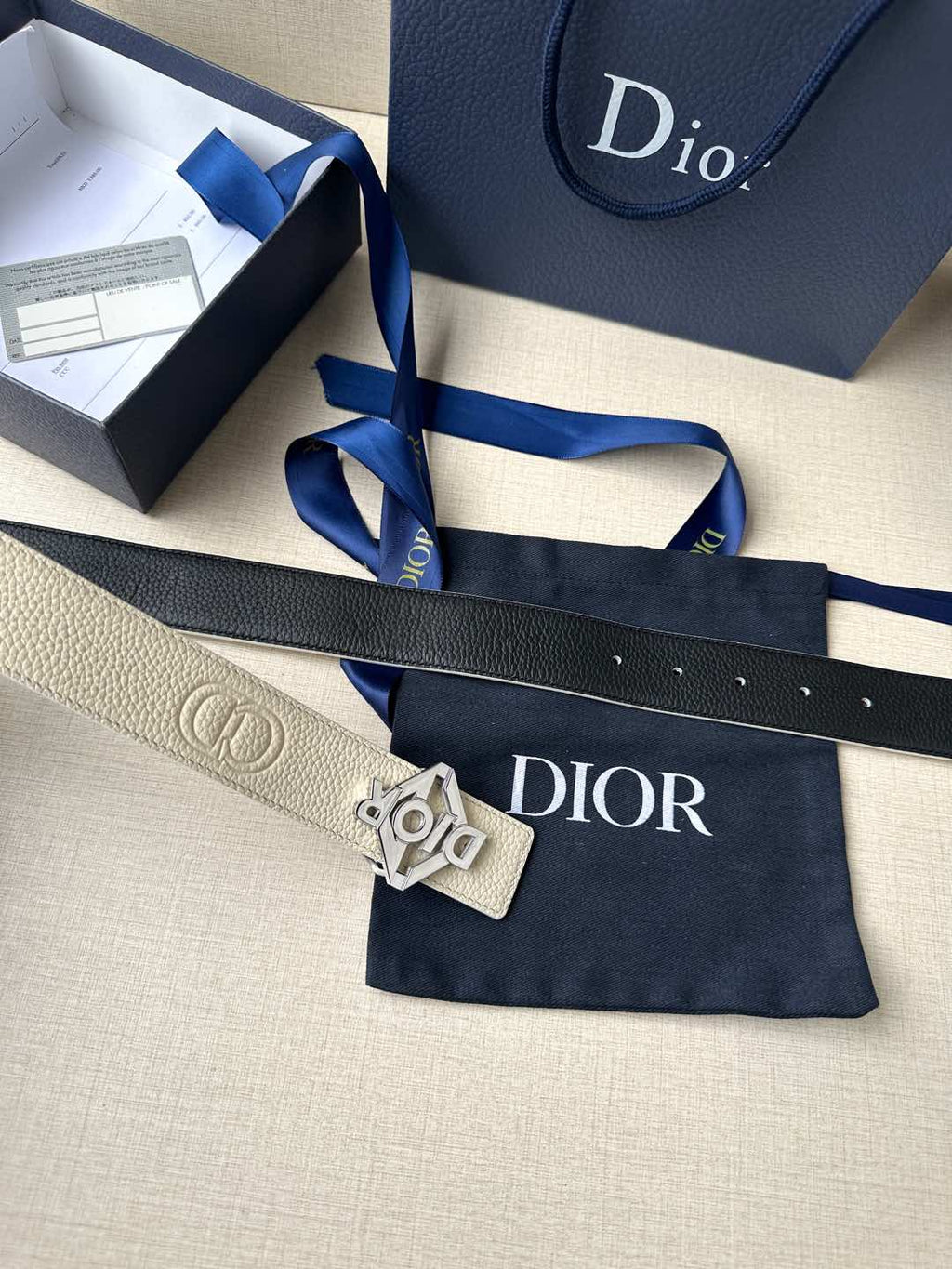 Ivory leather belt with Dior logo buckle and textured strap
