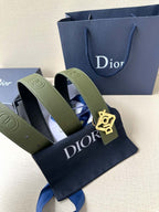 Dior leather belt with olive green strap and gold logo buckle detail