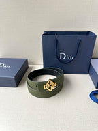 Dior leather belt with olive green strap and gold Dior logo buckle