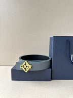 Dior belt in light blue leather with gold Dior buckle, shown with gift box