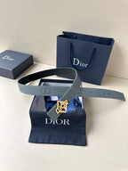 Dior belt in light blue leather with silver buckle, with Dior gift bag and box