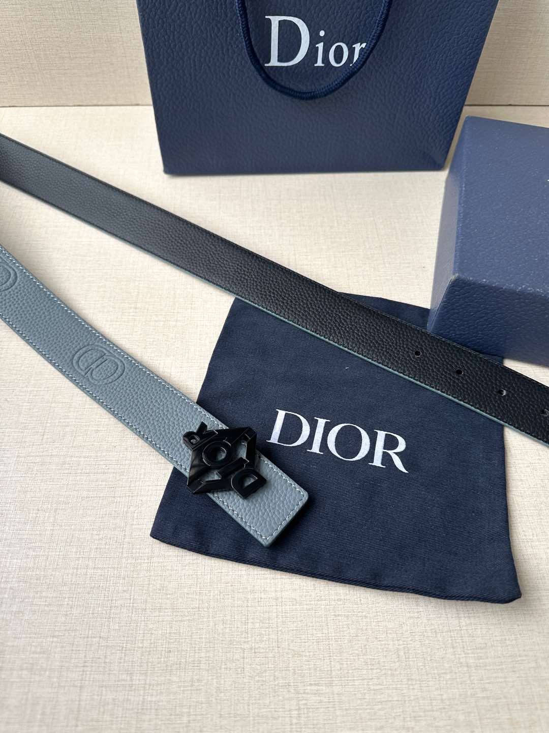 Dior belt in light blue leather with black Dior buckle and pouch