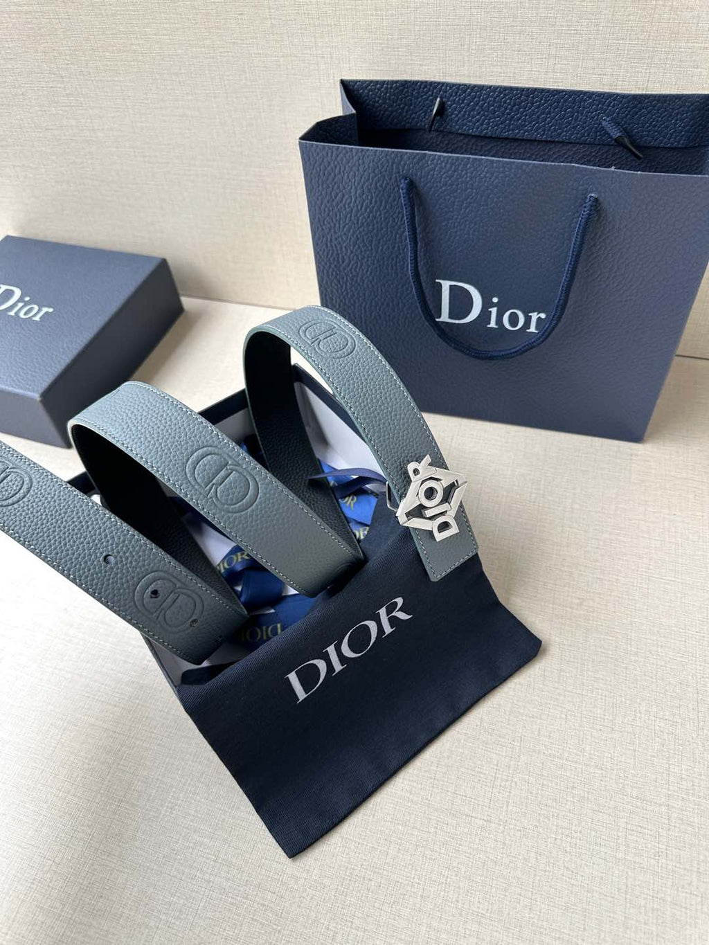 Dior belt in light blue leather with silver buckle on gift box and pouch