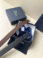 Dior belt in packaging: brown leather strap with gold-tone Dior logo buckle.