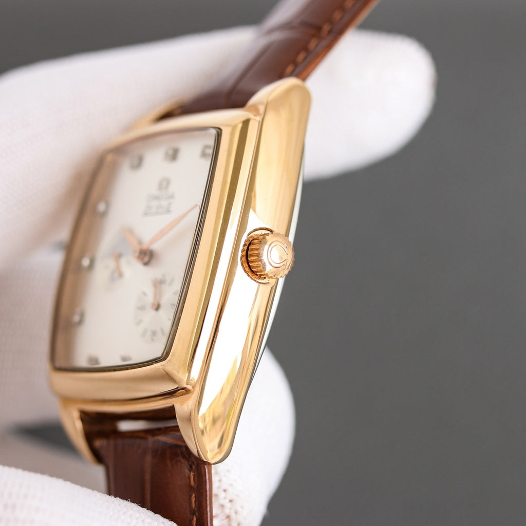 Gold-tone rectangular wristwatch with brown leather strap and crown detail