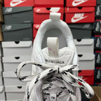 White sneaker tongue with BALENCIAGA branding and lace-up design