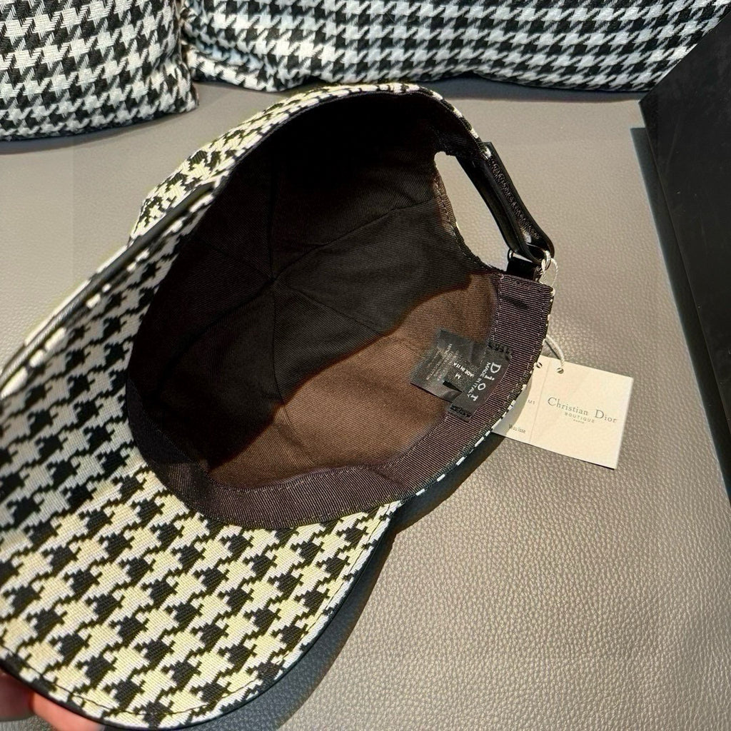 Houndstooth cap interior with adjustable strap and buckle