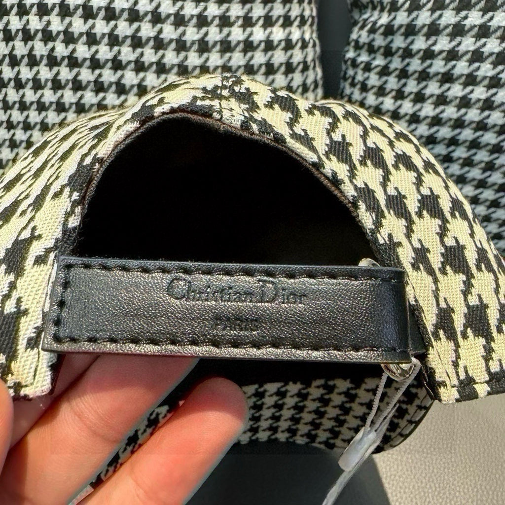 Adjustable strap on houndstooth cap with Dior-printed leather band