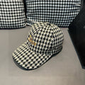 Houndstooth baseball cap in cream and black with curved brim