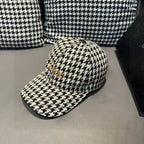 Houndstooth baseball cap in cream and black with curved brim