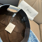 Dior cap in blue monogram denim with black strap and hanging tags