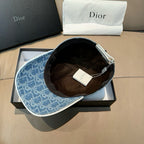 Dior cap in blue monogram denim with black interior visible, inside view