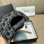 Black-and-white patterned baseball cap with adjustable strap and buckle detail