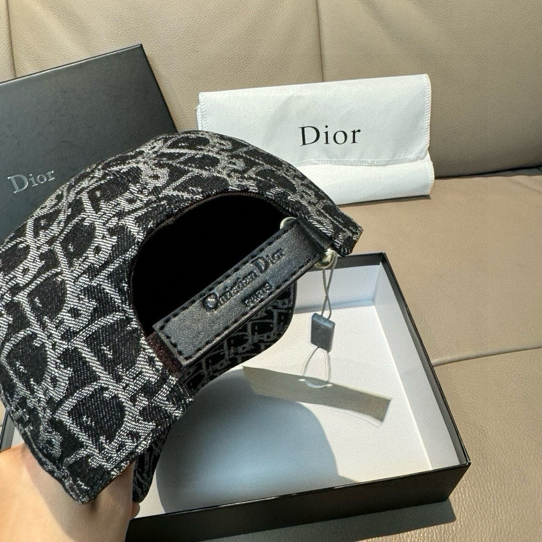 Black-and-white patterned baseball cap with adjustable strap and buckle detail