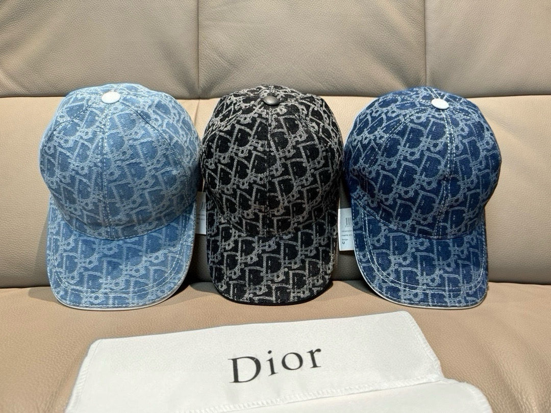 Set of three blue Dior-pattern baseball caps with curved brims