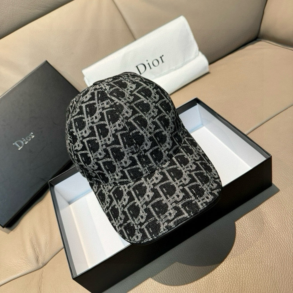 Black-and-white patterned baseball cap with curved brim, presented in gift box