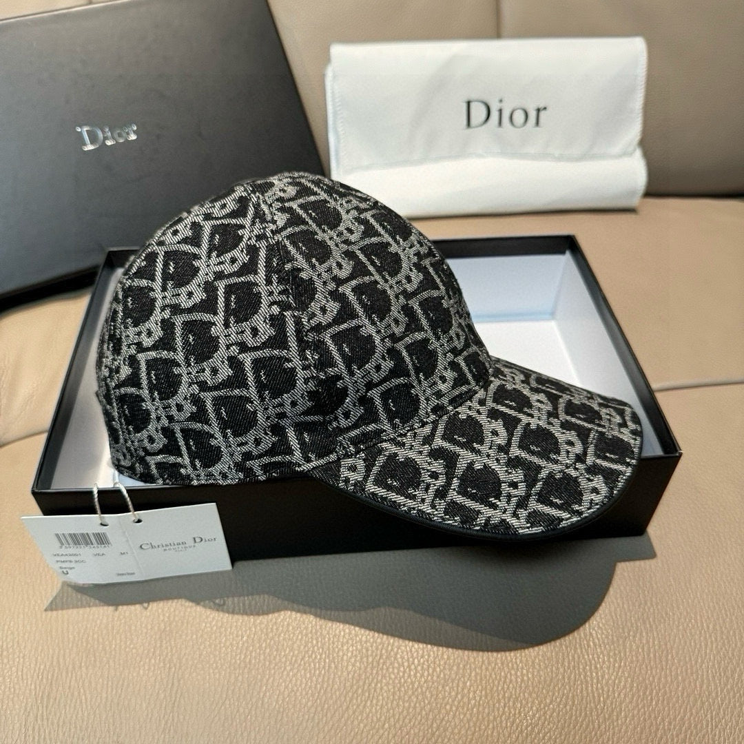 Black-and-white patterned baseball cap on display box with curved brim