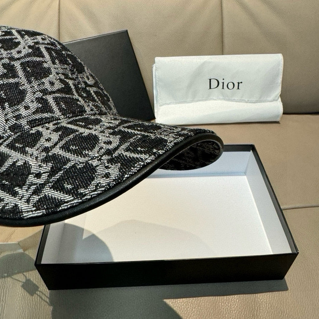 Black-and-white patterned baseball cap brim close-up with curved front edge