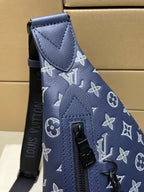 Louis Vuitton monogram bag handle in navy with leather top tab and side zipper