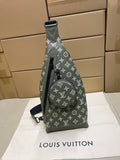 Louis Vuitton monogram mini sling bag in olive green, front view with strap