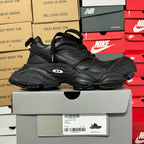 Black Balenciaga unisex chunky sneakers, side view with lace-up tongue and thick sole