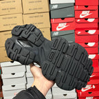 Black Balenciaga unisex sneaker outsole view with chunky tread pattern
