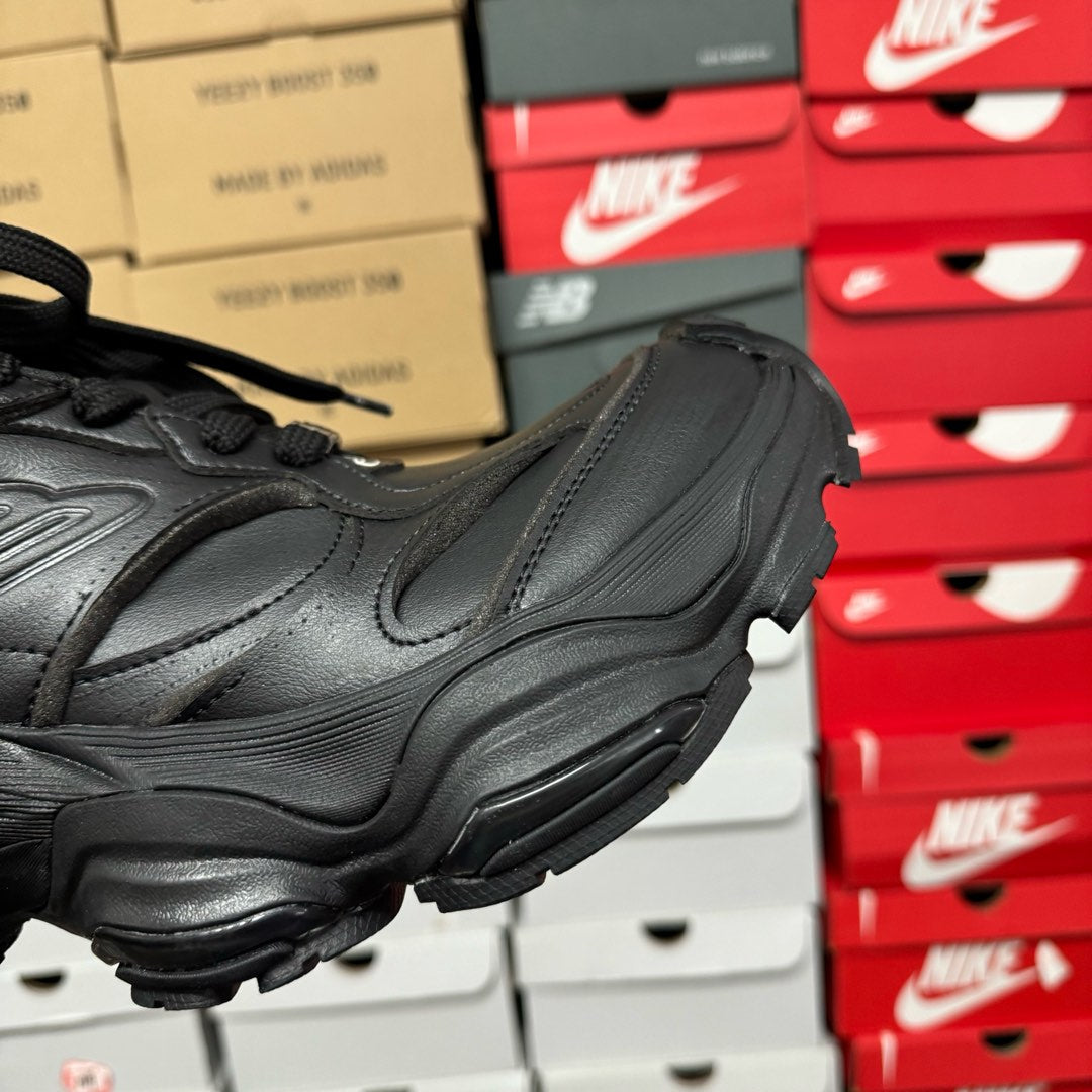 Black Balenciaga unisex sneaker side profile, cushioned sole and stitched paneling