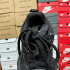 Black Balenciaga unisex sneaker heel and laces, top view with fabric pull loop