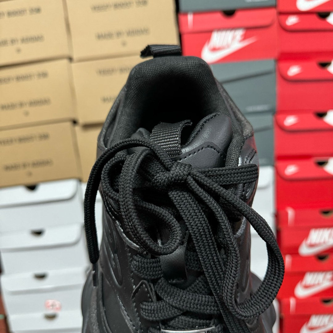 Black Balenciaga unisex sneaker heel and laces, top view with fabric pull loop