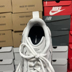 White lace-up athletic sneaker heel view with looped ankle collar
