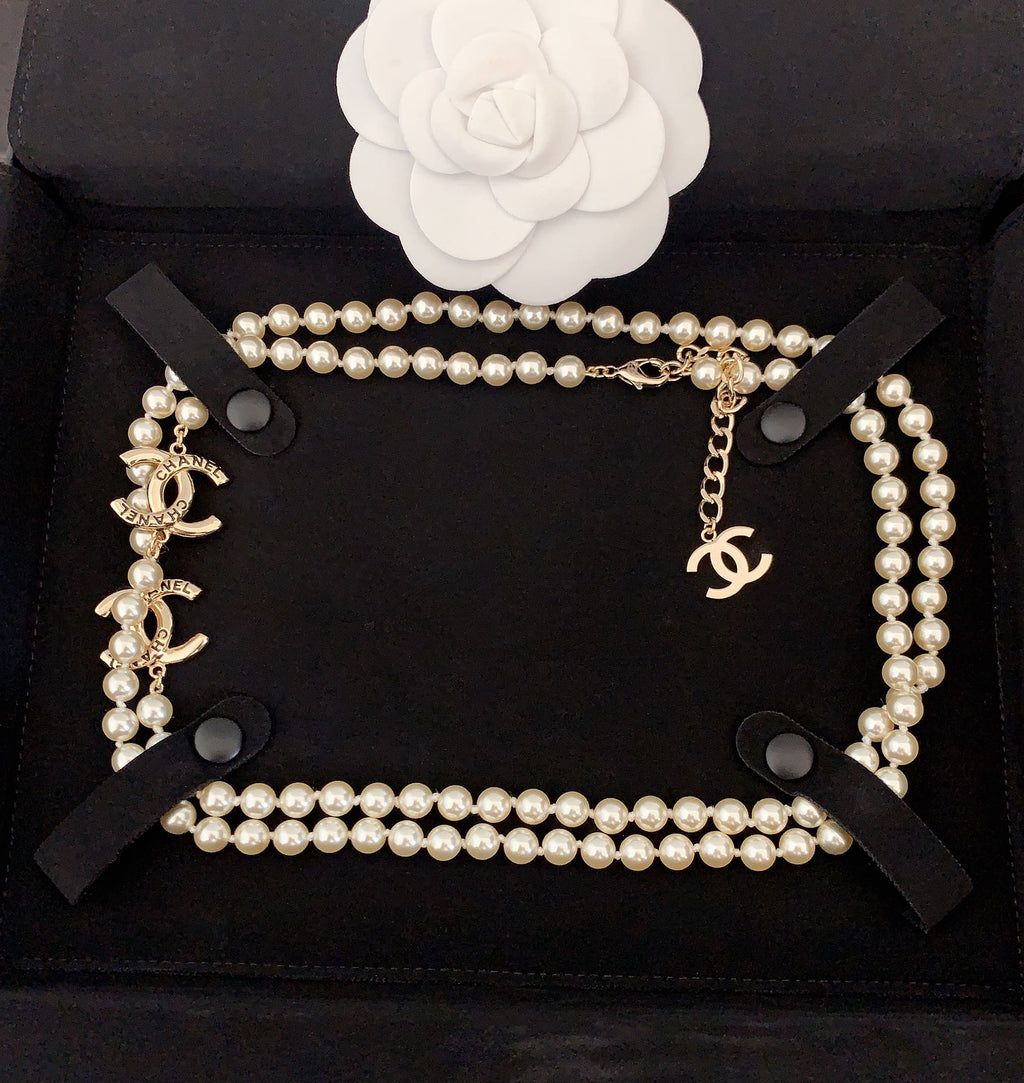 Pearl necklace with gold CC pendant and layered pearl loops