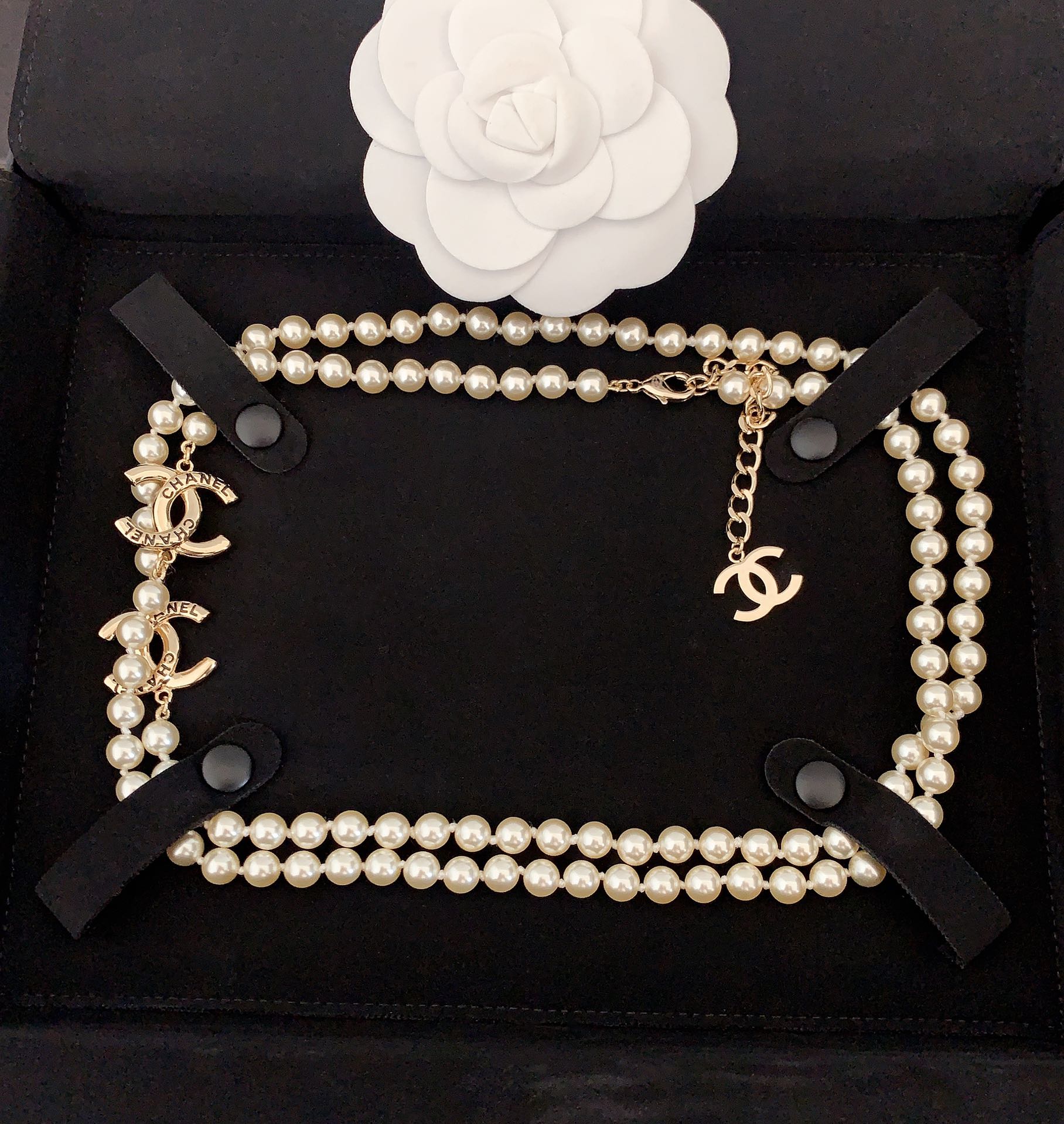 Pearl necklace with gold CC pendant and layered pearl loops