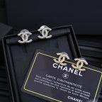 Silver-tone Chanel CC stud earrings with rhinestone detail in black gift box