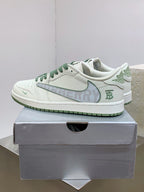 Burberry sneakers on box, white leather with green laces and blue logo detail