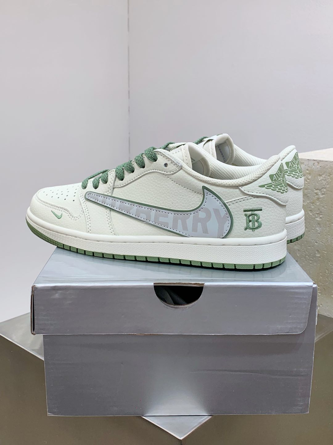 Burberry sneakers on box, white leather with green laces and blue logo detail