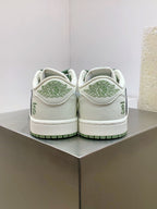 Burberry sneakers back view, white heel with green emblem and ridged sole