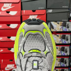 Grey mesh-backed sneaker with neon green collar and padded tongue tab
