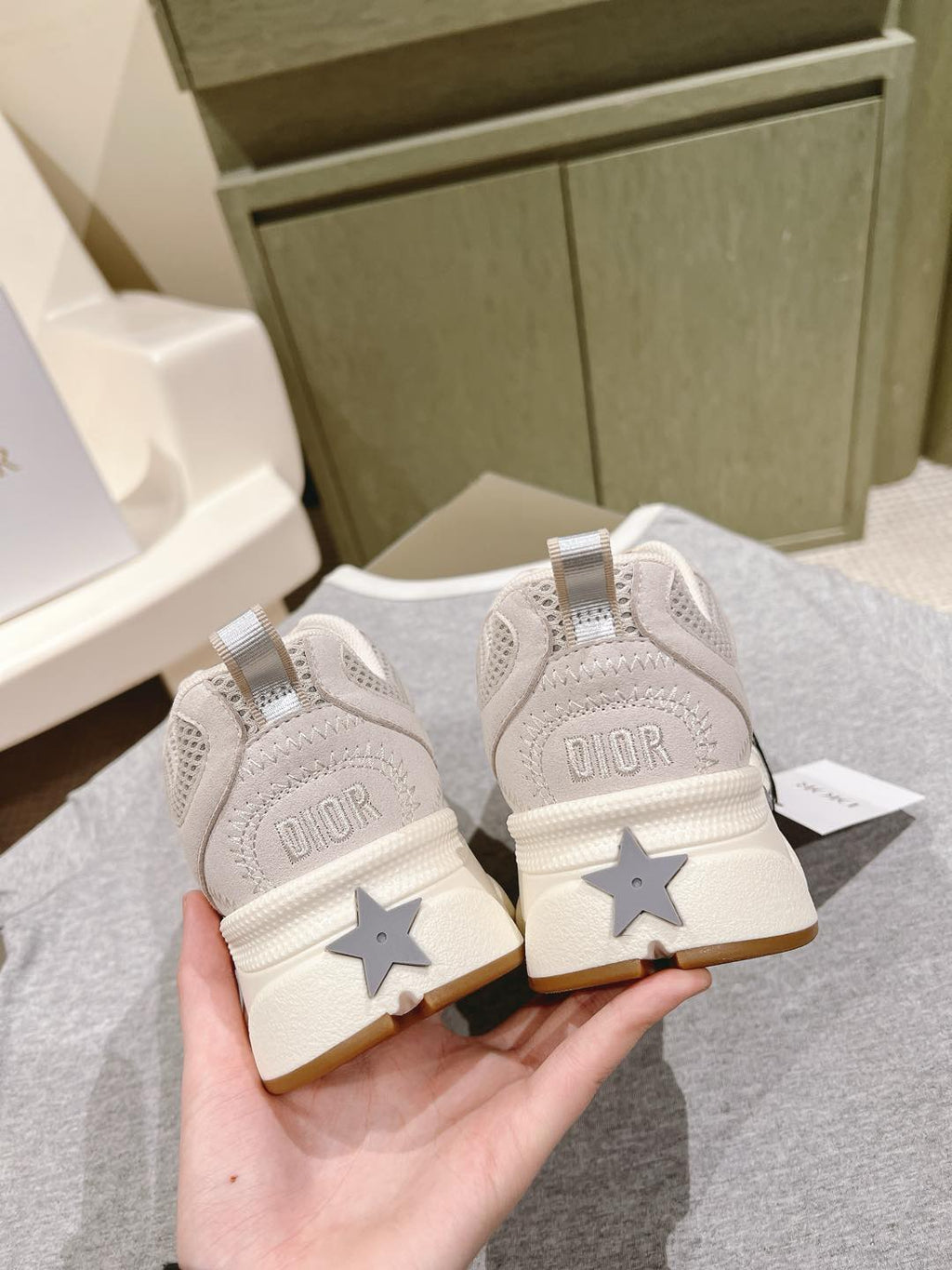 White Dior unisex sneakers, star patches on heel with printed 'Dior' branding