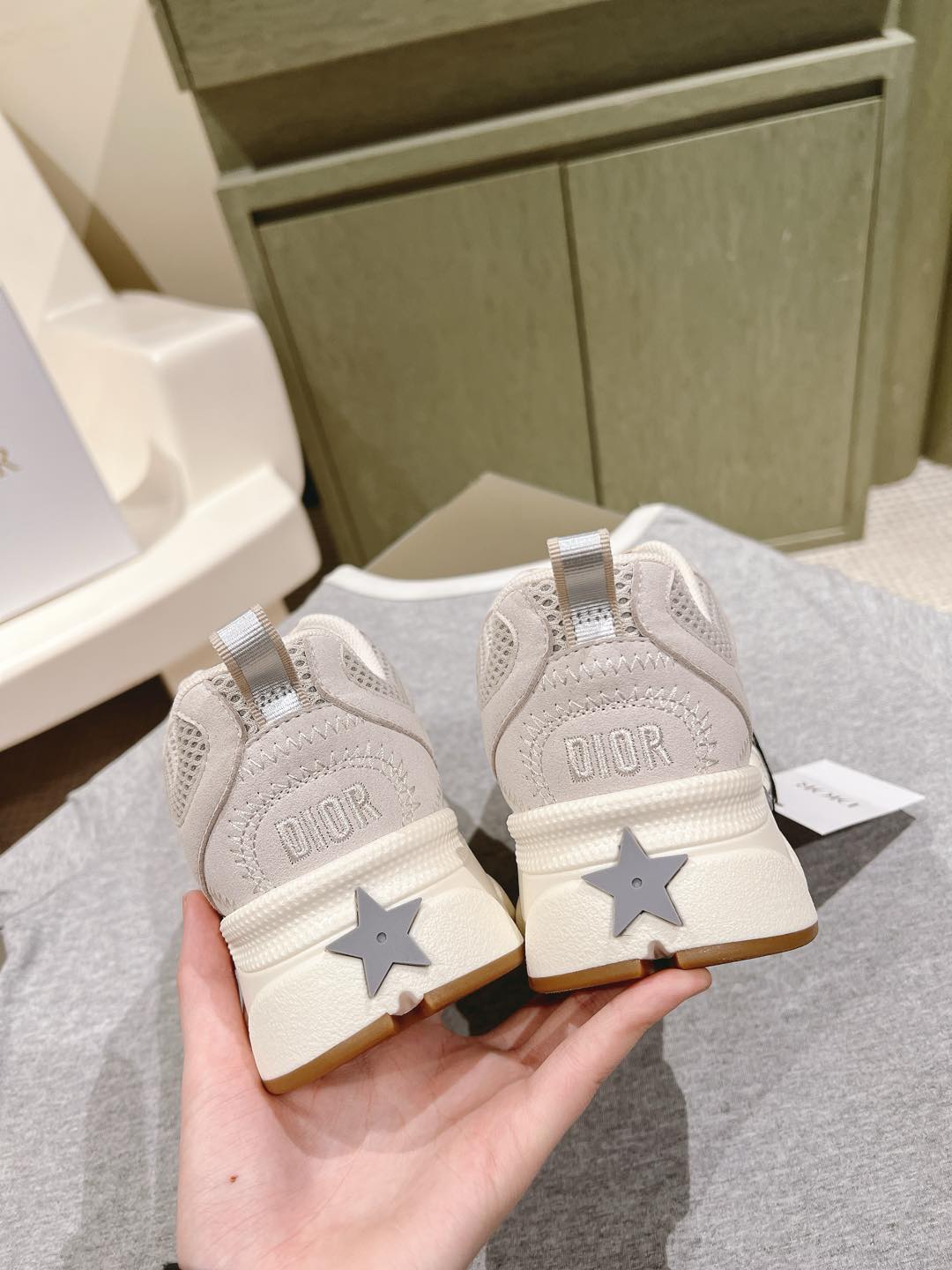 White Dior unisex sneakers, star patches on heel with printed 'Dior' branding
